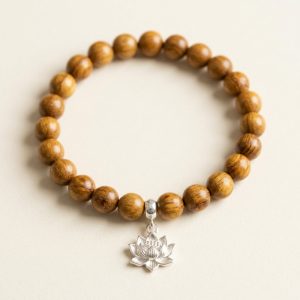 Vòng Tay Trầm Hương Nữ Phối Charm Sen Bạc S925